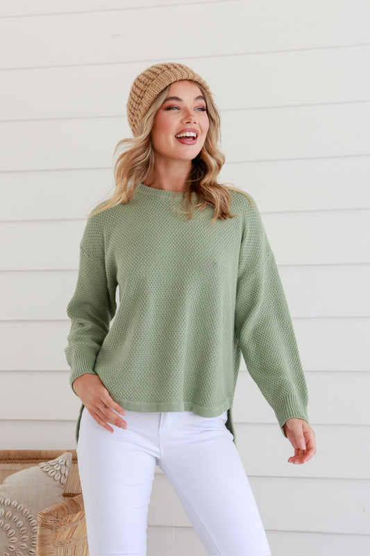 sage green knit jumper with high low fit and zip at the back