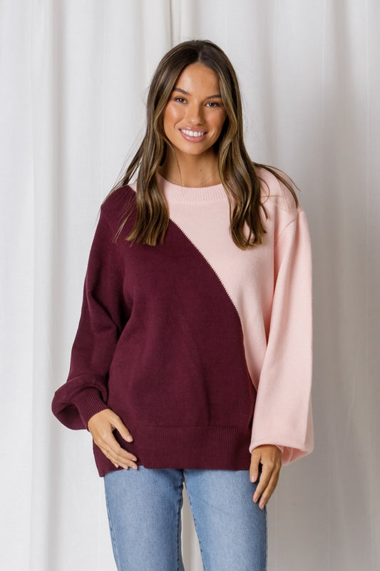 cute comfy knit jumper with two colours, pink and maroon 