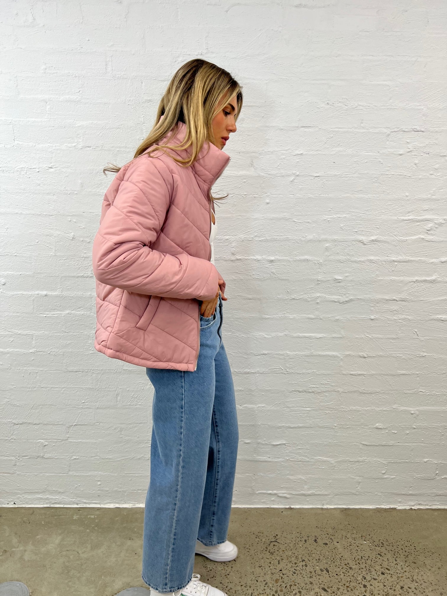 blush pink puffer coat with zip front and pockets